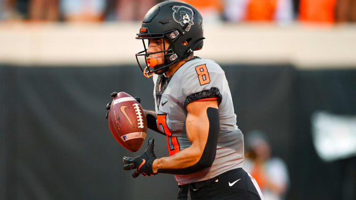 Oklahoma State wide receiver Braydon Johnson (8) runs for a touchdown during the first half of an NCAA college football game against Arkansas-Pine Bluff, Saturday, Sept. 17, 2022, in Stillwater, Okla. (AP Photo/Brody Schmidt)